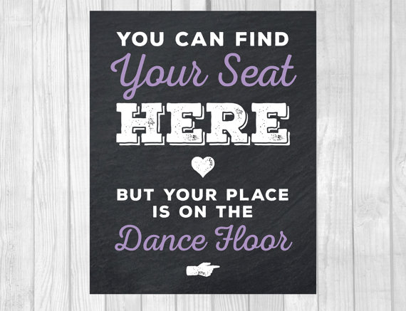 A Quinceanera-themed image featuring a chalkboard sign that says you can find your seat here, emphasizing the importance of finding one's place in the celebration