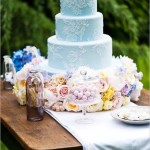 Quinceanera cake, a three tiered Quinceanera cake on a wooden table