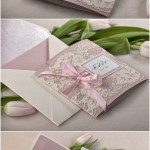 Quinceanera image featuring a set of three different colored cards for a Wedding Invitation and wedding favors