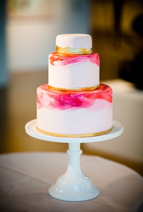 Quinceanera cake, a three tiered cake on a white cake plate