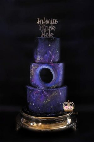 Quinceañera dresses, a purple cake with a black hole in the middle at a space themed quinceanera