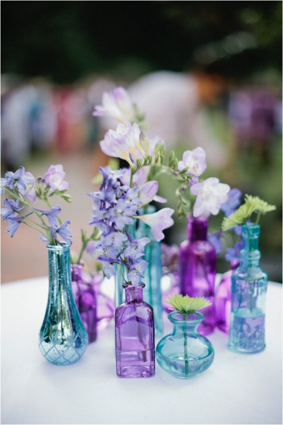 Teal and purple Quinceanera colors - Wedding Invitation, a group of purple and blue vases with flowers in them