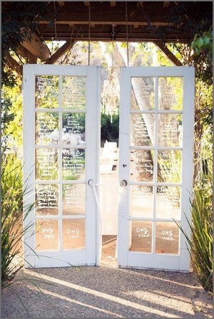 A couple of white doors sitting next to each other in a Quinceanera venue