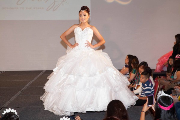 Quinceanera gown, a woman in a Quinceanera dress on a runway