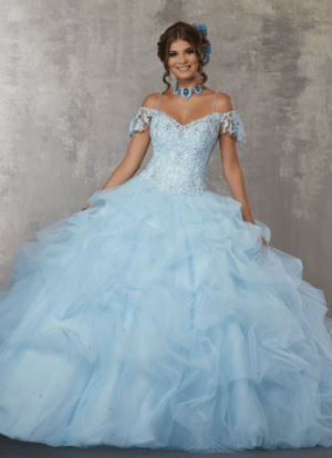 Quinceañera dresses, a woman in a blue dress posing for a picture at Kunsthaus Bregenz