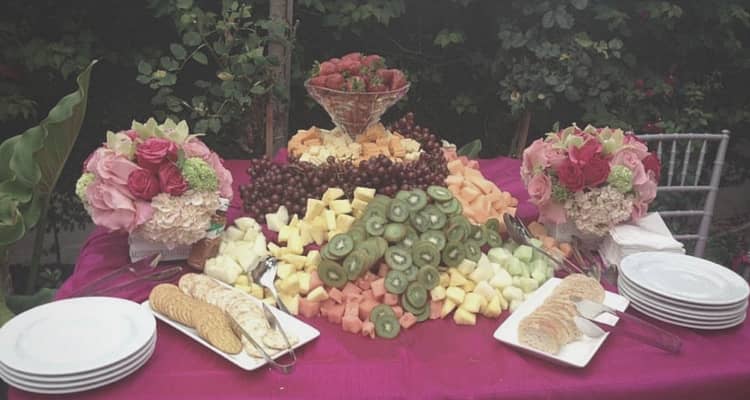 Table with various fruits and crackers
