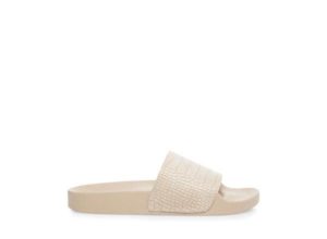 Quinceanera image of a pair of white sandals on a white background