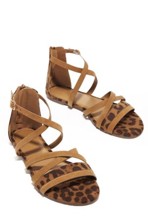 A pair of tan Quinceanera shoes with leopard print sandals on a white background