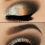 A close up of a woman's eyes with silver and golden metallic eye makeup, perfect for a Quinceanera