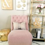 Quinceanera, a pink chair sitting in a living room next to a bookshelf in an interior design setting
