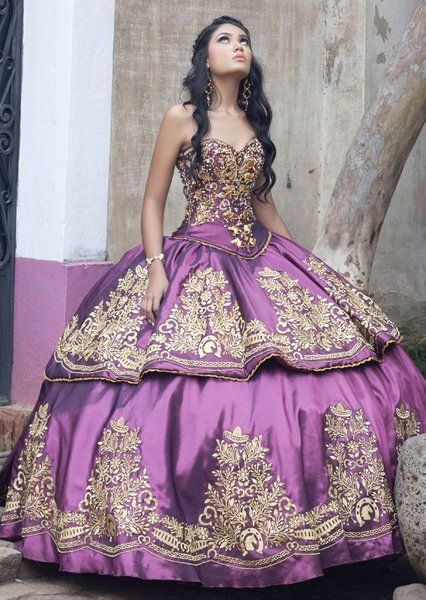Quinceañera dress creation, featuring a woman in a vibrant purple and gold dress with a charro theme