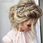 Quinceanera image of a woman with blonde hair wearing a white dress and a hairstyle for a round face