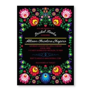 A Quinceanera party invitation with colorful flowers on a black background