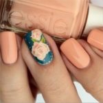 Quinceanera image of nail designs with a person holding a bottle of nail polish