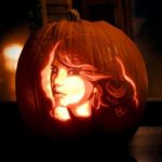 Quinceanera celebrity pumpkin carving, a carved pumpkin with a woman's face on it