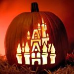 A Quinceanera-themed image featuring a carved pumpkin with a castle on it
