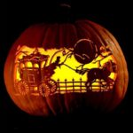 Quinceanera theme: A pumpkin carved to look like a train for Happy Halloween