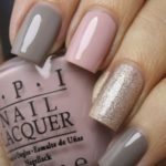 A person holding a bottle of Quinceanera themed nail polish