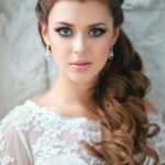 Quinceanera image: a woman with long hair wearing a Quinceanera dress