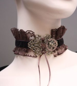 A close up of a Victorian Quince theme with a mannequin wearing a choker