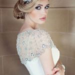 A woman in a Quinceanera dress posing for a picture, showcasing 20s Quinceanera hairstyles