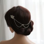 Quinceanera headpiece, a woman in a Quinceanera dress with a hair piece