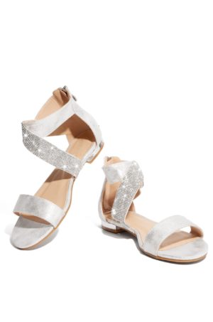 A pair of white sandals on a white background, perfect for a Quinceanera celebration