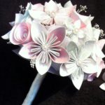 A beautiful floral design with a bouquet of paper flowers on a black background