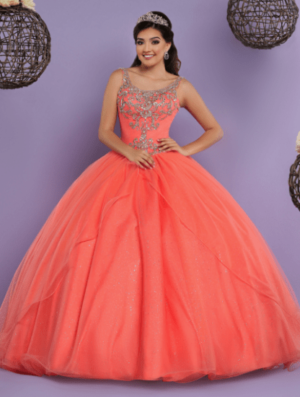 A woman in a ball gown posing for a picture wearing Quinceañera dresses