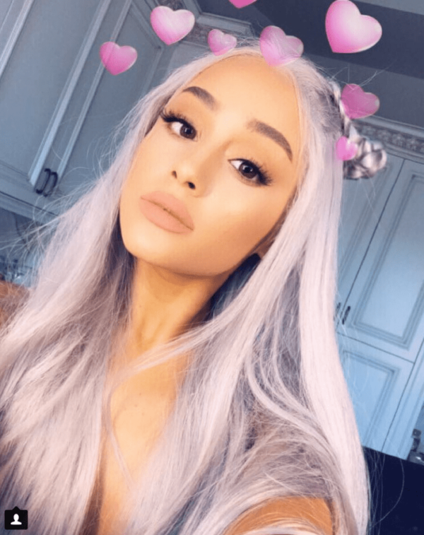 Ariana Grande, a woman with long grey hair and hearts on her head, Quinceanera theme