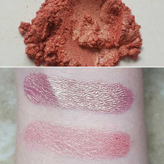A close up of a person's arm with lip makeup