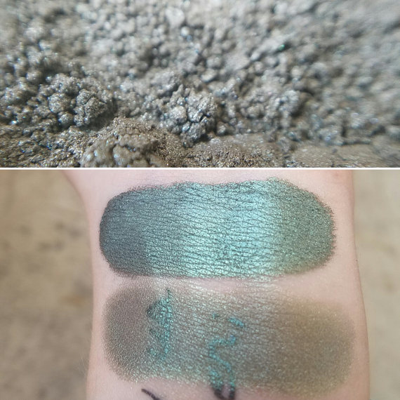 A close up of a person's arm with a pair of Quinceanera eyeshadow