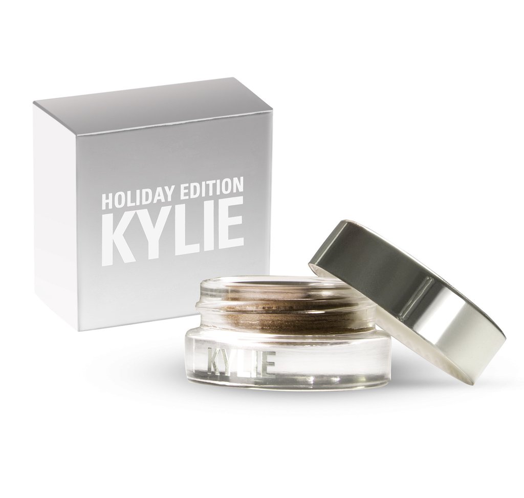 A silver Kylie Cosmetics eye shadow jar next to a silver box
