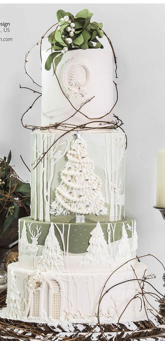 A quinceanera cake with a three-tiered design and a Christmas tree topper in a forest setting