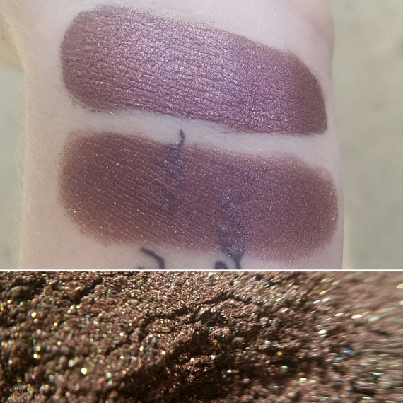 A close up of two different shades of lilac eyeshadow for a Quinceanera