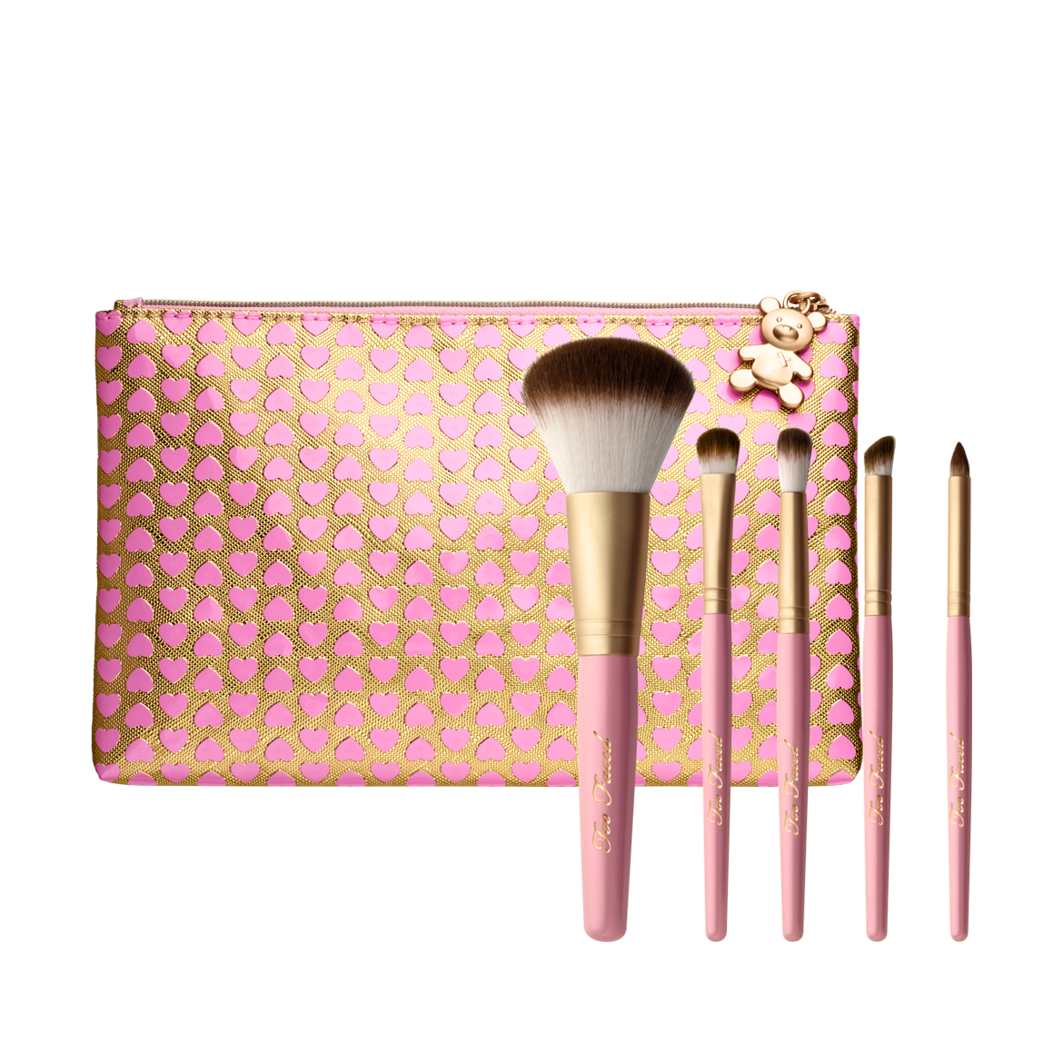 Quinceanera image: A set of makeup brushes and a pouch from Too Faced, featuring a teddy bear design