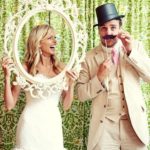 Quinceanera photo booth, a man and a woman in vintage attire posing for a picture
