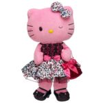 A Quinceanera-themed stuffed toy of a Hello Kitty wearing a dress