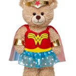 A Quinceanera-themed image featuring Wonder Woman, a teddy bear dressed as Wonder Woman