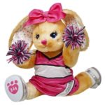 A Quinceanera themed image featuring doll bears, including a teddy bear dressed as a cheerleader