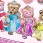 Quinceanera-themed image of a doll stuffed toy and a group of teddy bears dressed as princesses