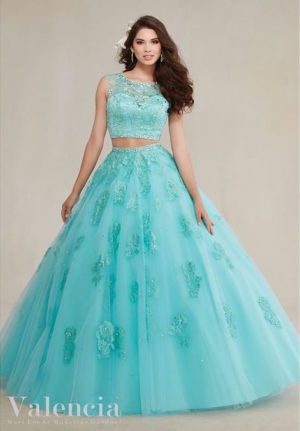 Morilee Quinceanera dresses two piece Quinceañera dresses, a woman in a blue dress posing for a picture