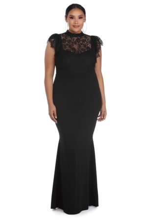 A woman wearing a black dress with a lace top, styled in a Quinceanera gown