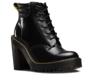 A pair of black boots with a yellow sole, Doc Martens, perfect for a Quinceanera celebration in Riverdale.