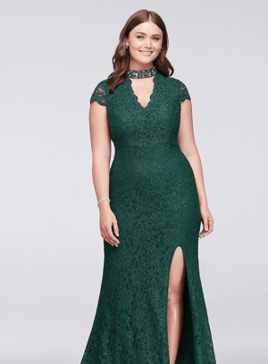 A Quinceanera woman wearing a green lace day dress with a high slit