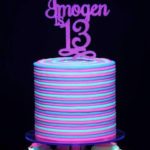 Light, a Quinceanera-themed cake with a pink and blue color scheme and the number 13 on top