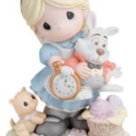 A Quinceanera figurine of a little girl holding a clock