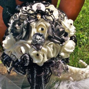 A Quinceanera at Walt Disney World® Resort holding a black and white bouquet