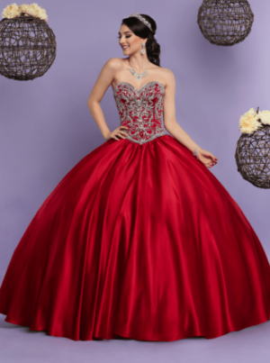 A woman in a red ball gown posing for a picture, wearing a 80379 q by davinci Quinceañera dress