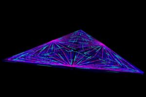 A perfect lighting for a Quinceanera event with a triangular shaped object in the dark